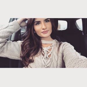 Oversized sweater with neck tie detail